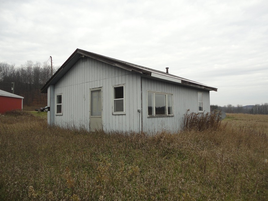 7807 Reynolds Rd, Elmira, MI 49730 - photo 1