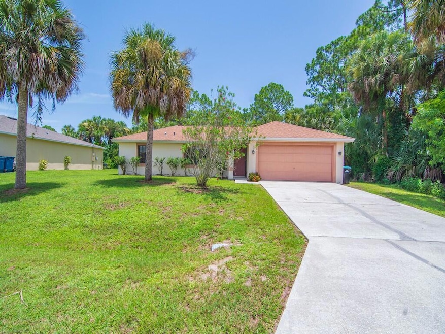 557 Audubon Ave NE, Palm Bay, FL 32907 - photo 1