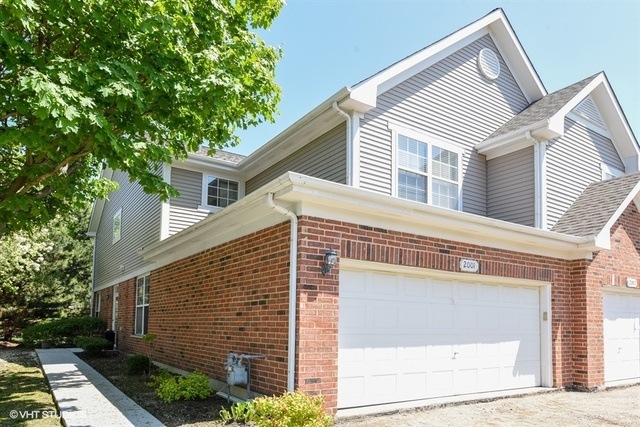 Rarely available END UNIT with 2 car garage!