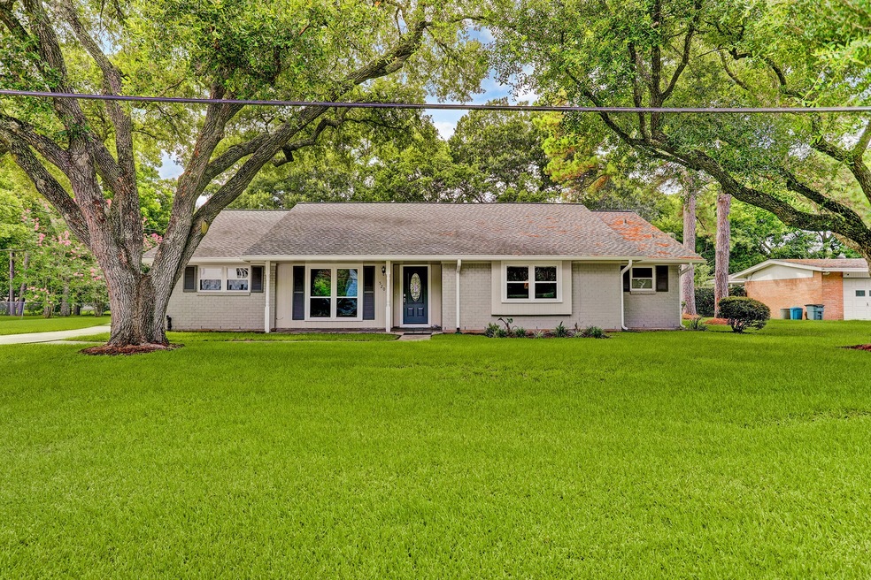 View of the front of the home! Lots of greenspace, in the front and the backyard. New gutters in the front and back in 2021!