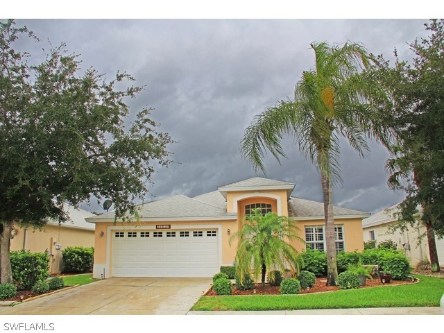 Front, Driveway with Detailed Landscaping