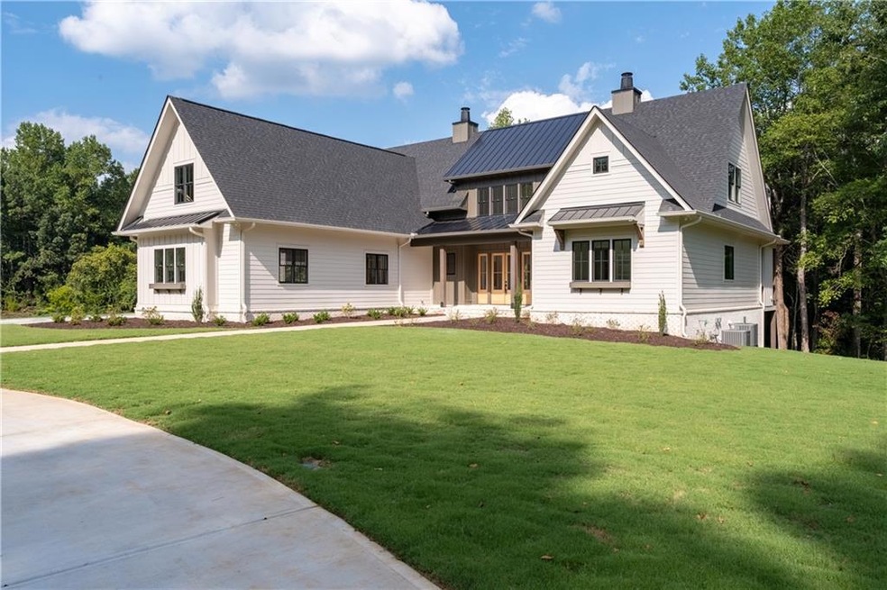 Stunning farmhouse nestled on 2 Acres in super Eas