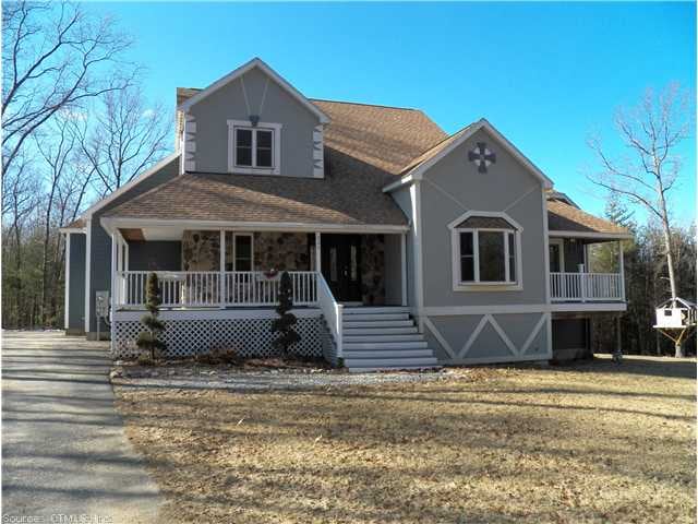 Exterior Front. Front view shows wrap around porch
