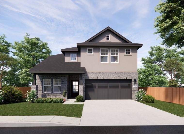 View of front facade featuring brick siding, an a