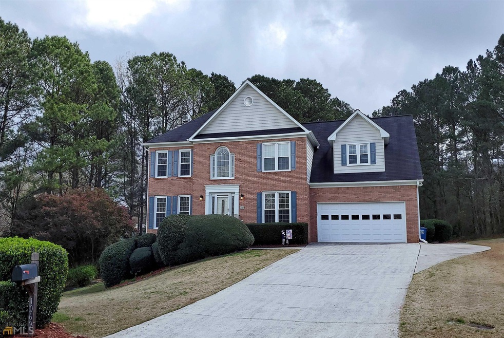 1060 Ashford Manor Ct SW, Lilburn, GA 30047 - photo 1