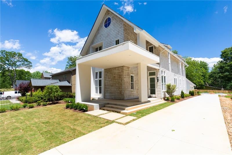 Incredible, contemporary shingle exterior with pro