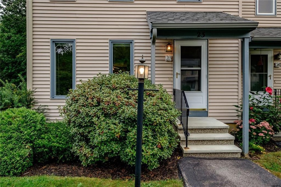 The entrance is well landscaped and...
