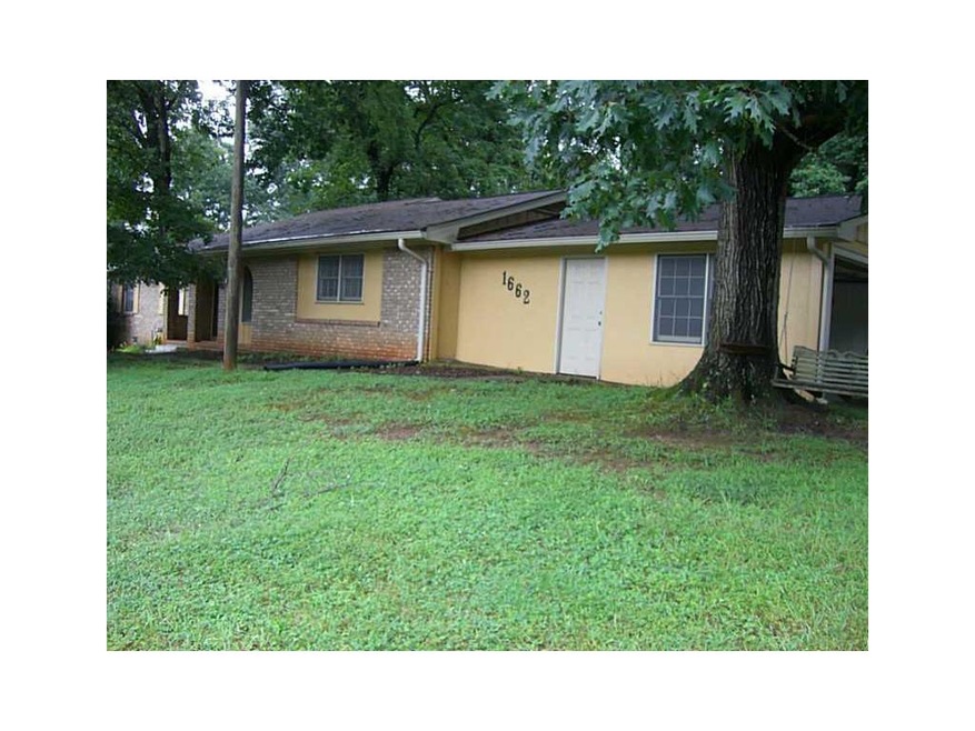 Exterior Front. Large Four bedroom ranch.