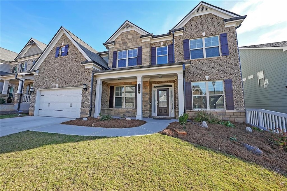 Craftsman house with covered porch, a garage, and 