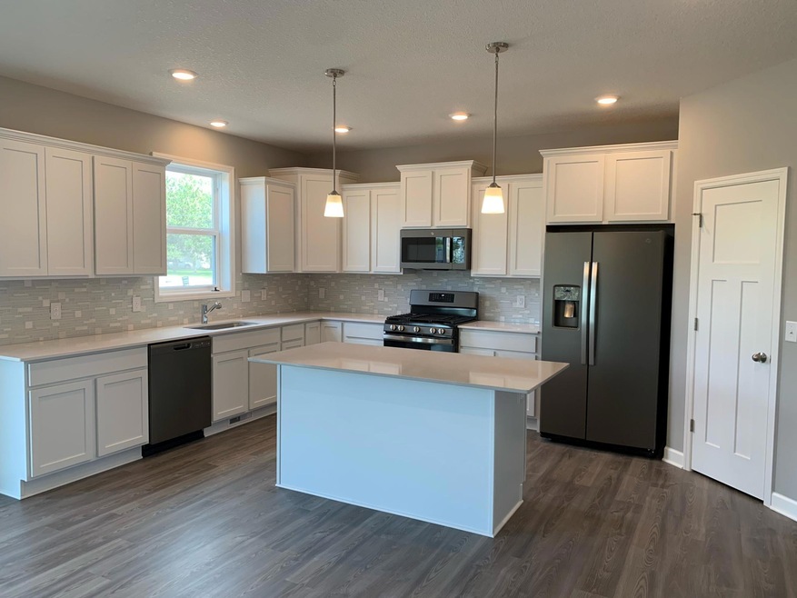 Located neatly near Northfork Golf course, walking distance to parks, and plenty of trees to be seen.  A modest community with only 80 homes which will surely provide the serenity and privacy you are looking for. Model photo.