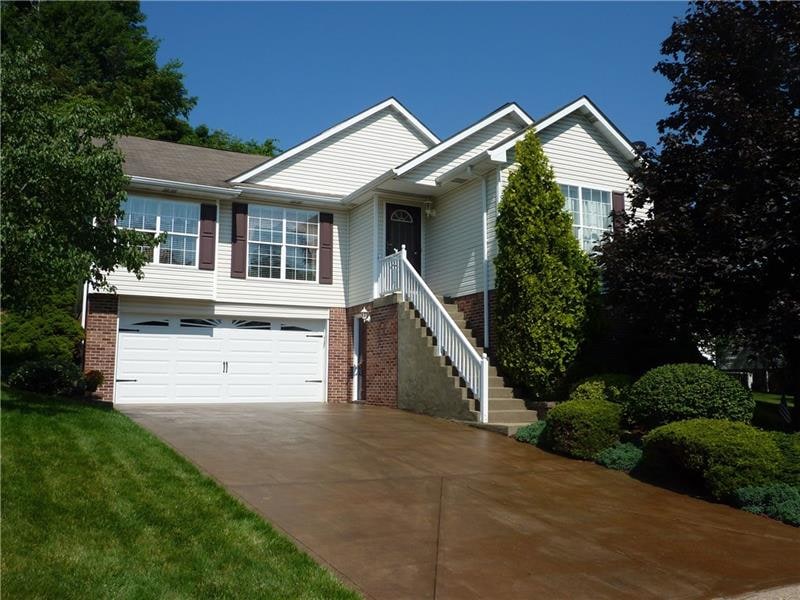 Lovely landscaped, great curb appeal & re-sealed d