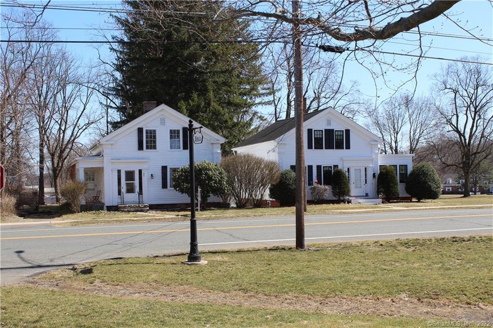 Beautiful home (left) across from the Green and Su
