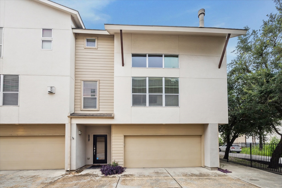 This modern townhouse features a three-story desig