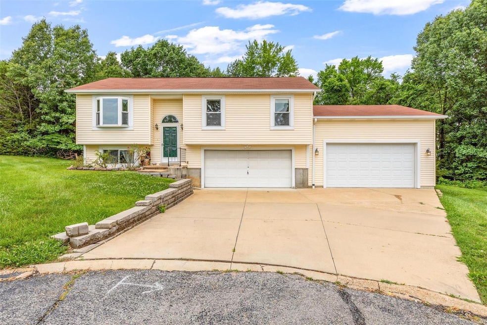 Welcome home to your FOUR car garage!