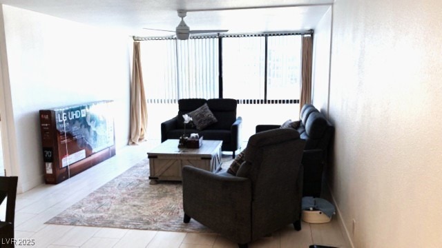 Living room featuring ceiling fan