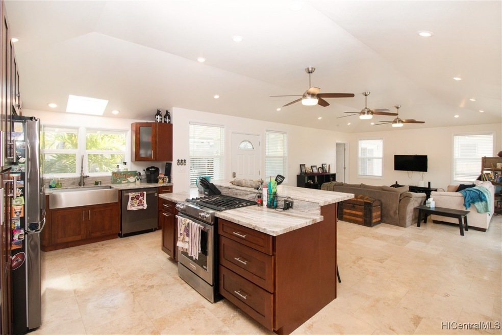Open plan kitchen with stainless steel appliances