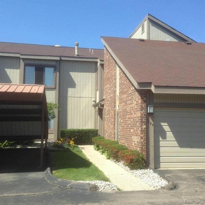 7455 Front entry walkway.  NOTE: Carport space on 