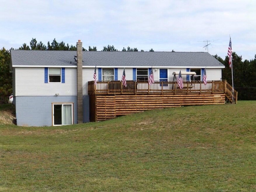 136 Huffman Lake Rd, Vanderbilt, MI 49795 - photo 1