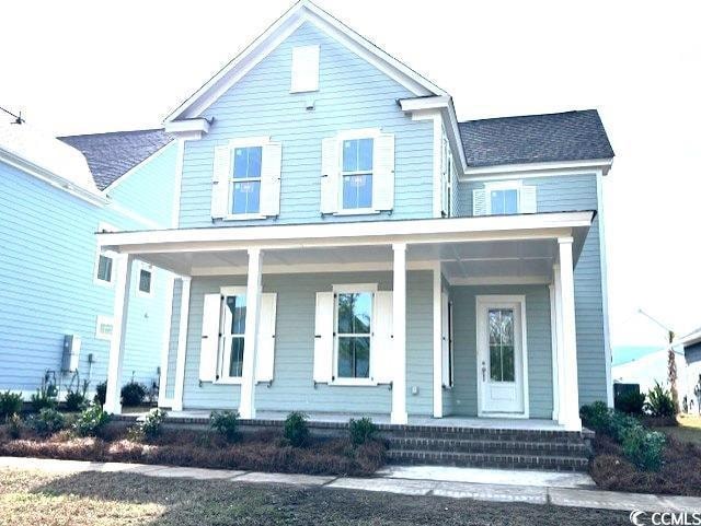 View of front facade featuring a porch