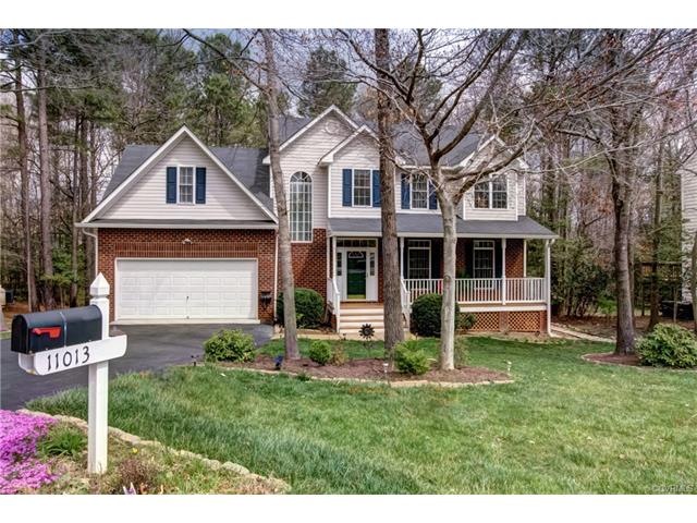 Garage with storage and cabinetry. Front porch. Ma