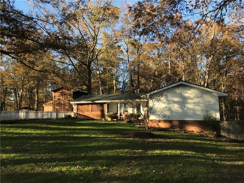 View as you drive up the driveway - front porch is