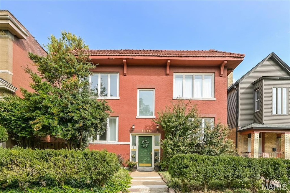View of front of property featuring brick siding