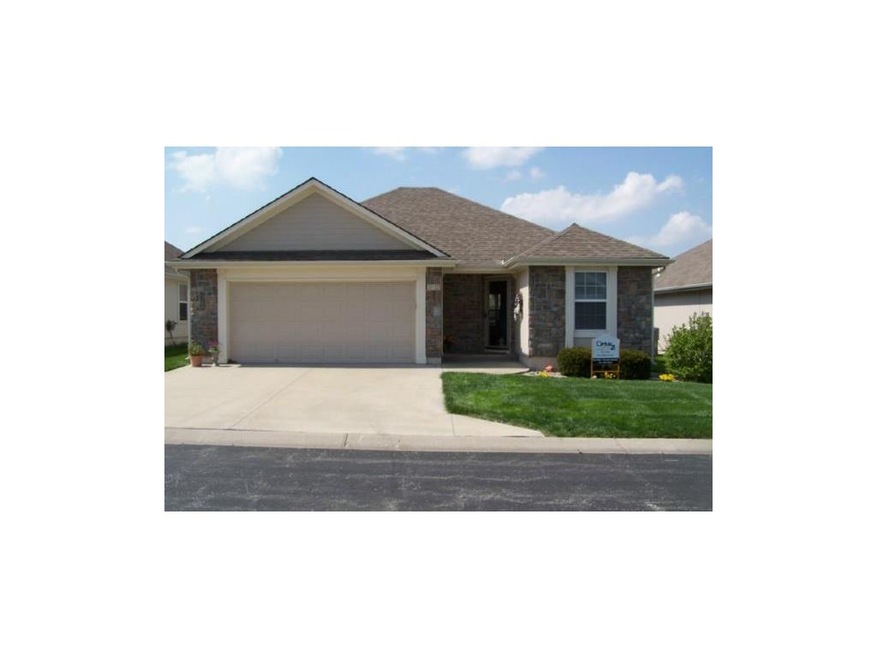 512 Neptune Dr, Raymore, MO 64083 - photo 1