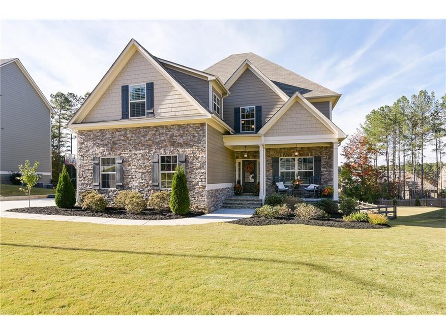 Stunning stone accents and inviting front porch!