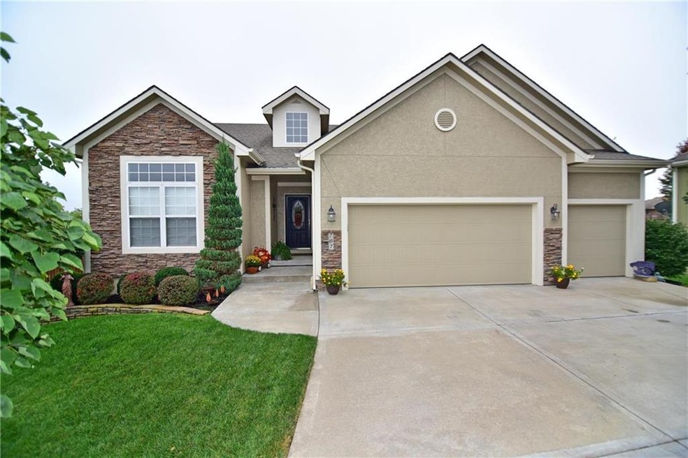 Beautiful home is professionally landscaped - thes