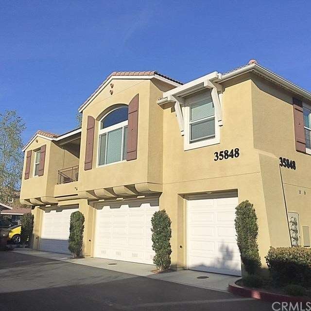 SINGLE CAR GARAGE WITH 1 COVERED CARPORT AS WELL.