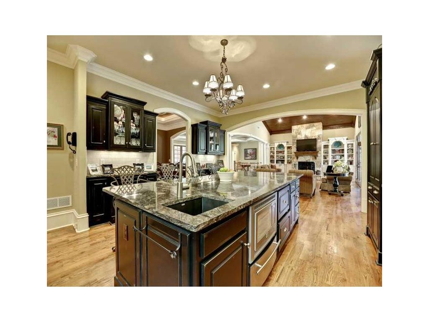 Kitchen. Kitchen opens to huge family room with fl