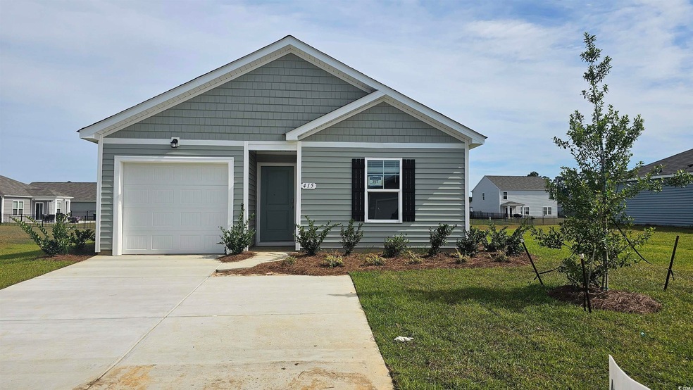 View of front of home featuring a garage and a fro