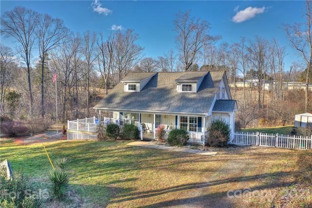 Waterfront home on 6.2 acres!  Bring your horses and enjoy Lake Norman Living.