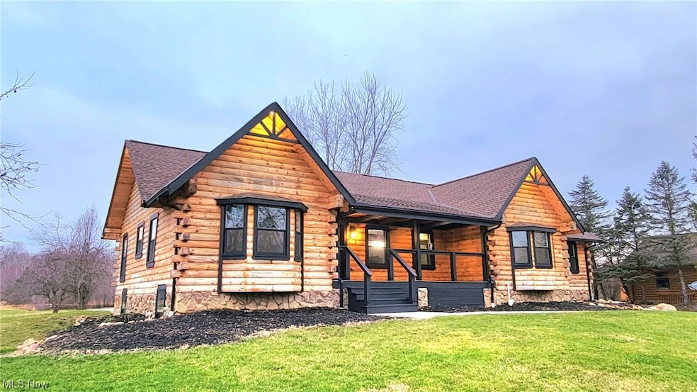 View of front of property featuring a front yard