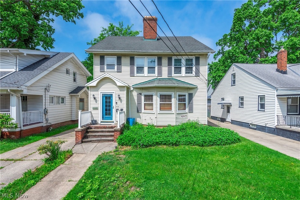 View of front of home featuring a porch and a front lawn