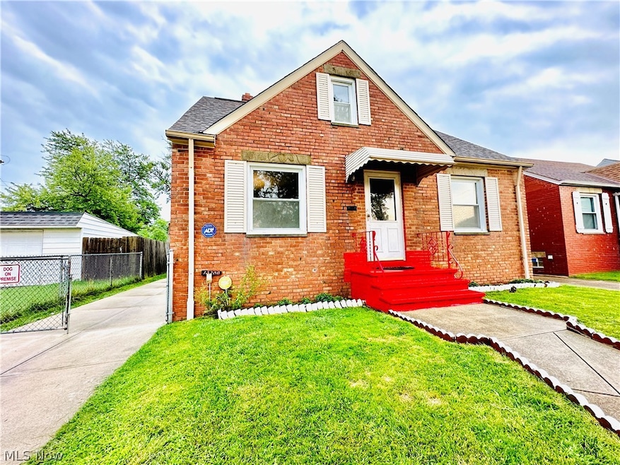 View of front of property with a front yard