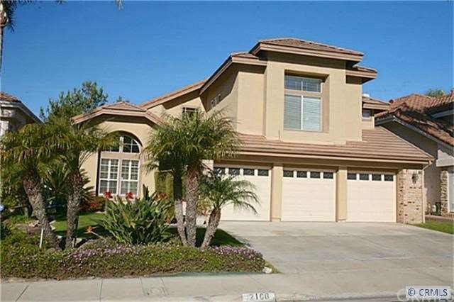 2106 Via Viejo front exterior. Large driveway with