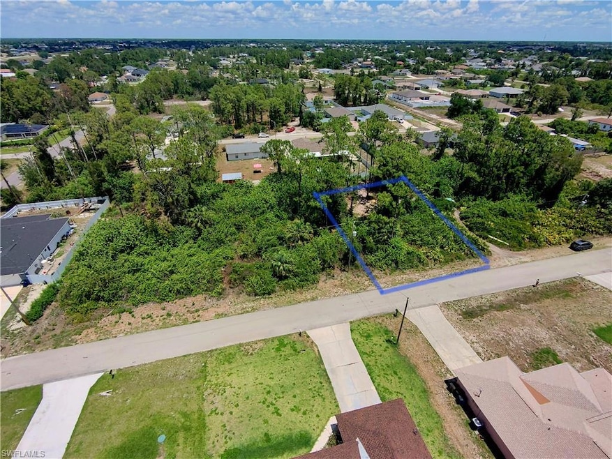 Aerial view of residential area with property boun