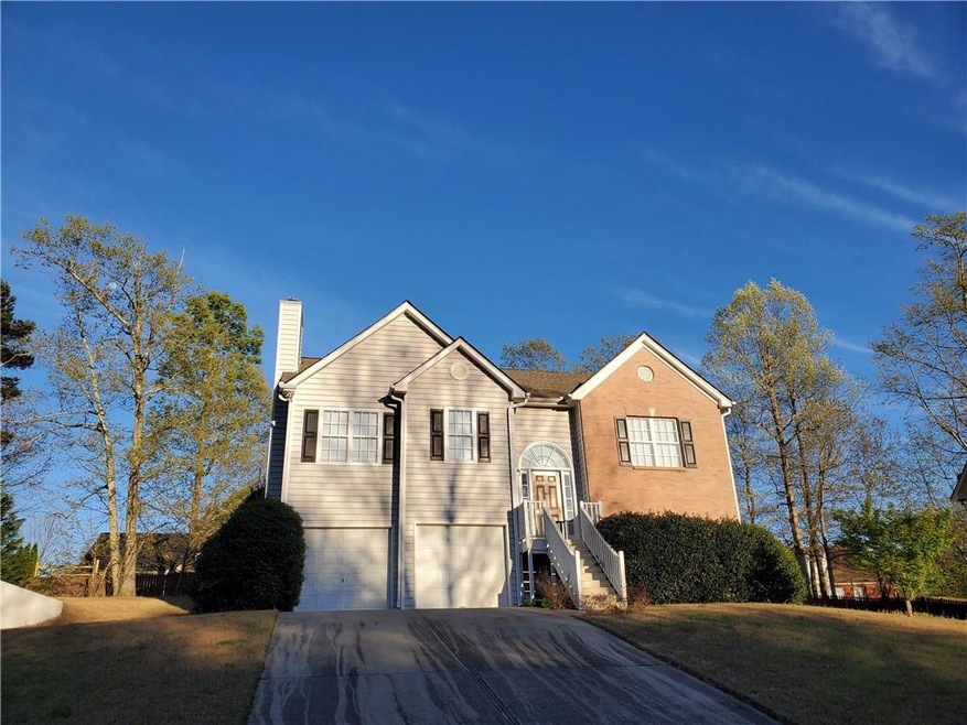 View of front of home with a garage