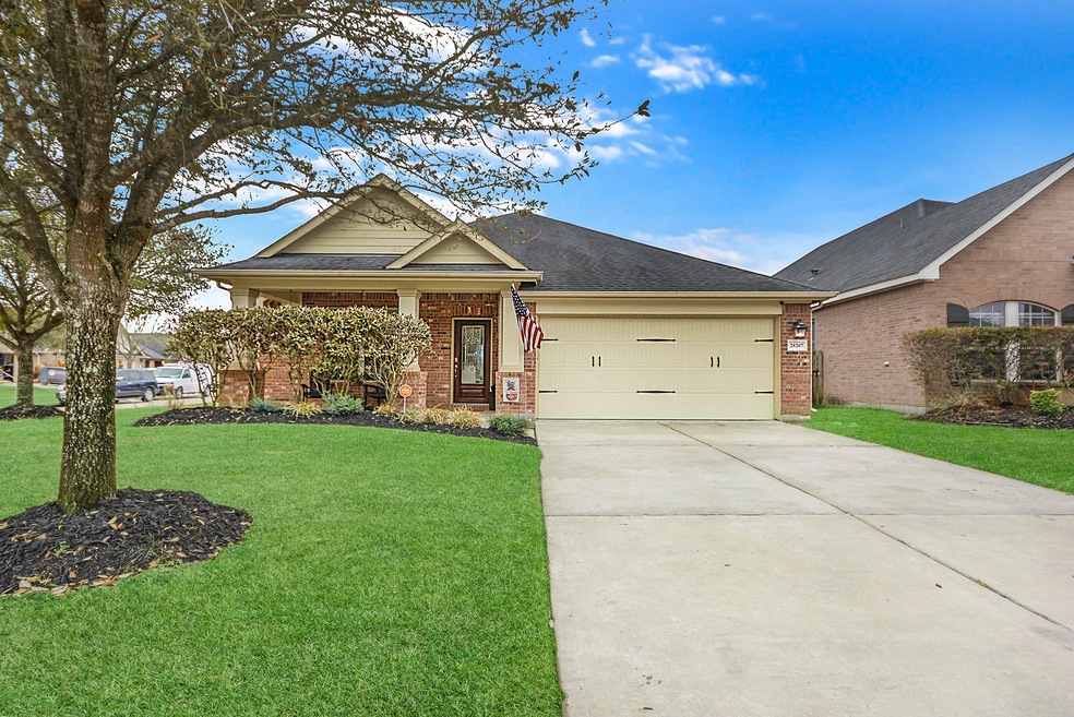 Welcome home to 28207 Sweet Oak Lane!