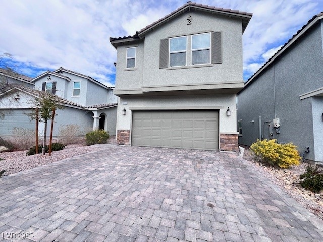 Front facade featuring a garage