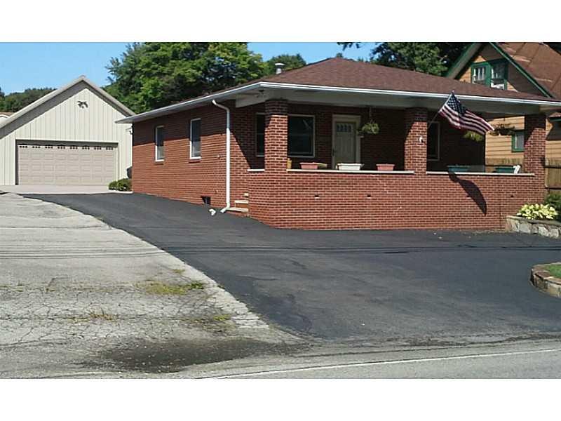 Exterior Front. All Brick, new garage, nice curb a