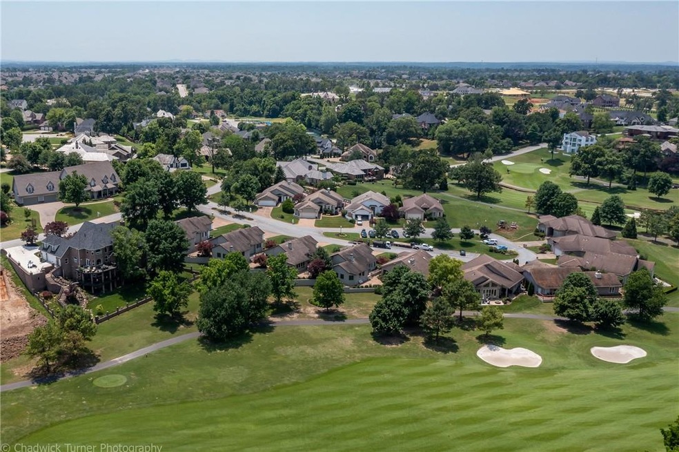 Aerial view of the golf course overlooking this ex