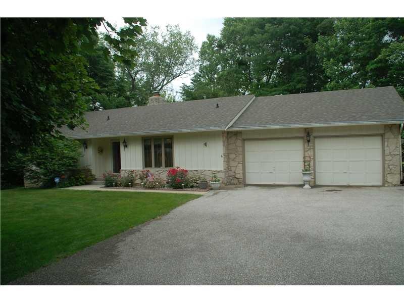 Exterior Front. Peace and quiet and the end of cul-de-sac...many updates, asphalt drive, shade trees and more!