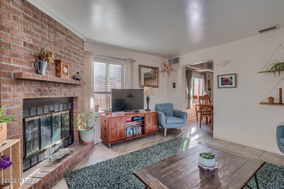 Guest house living room with fireplace.