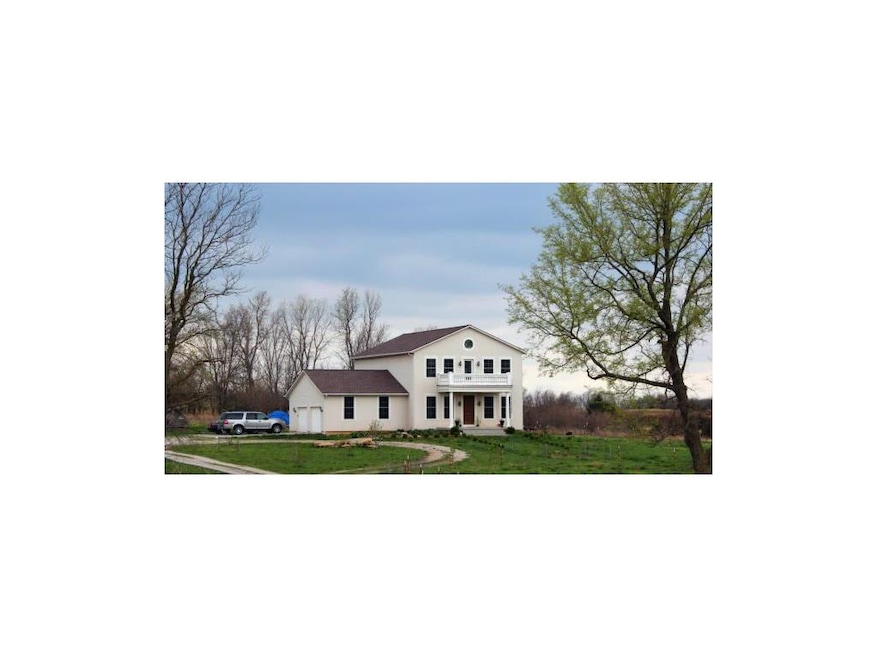 Front View from Road of Country Manor. Imagine the
