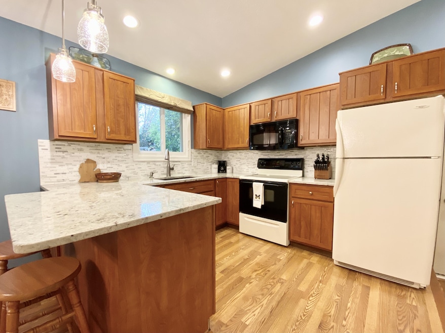 900 Woodspointe Dr SW, Byron Center, MI 49315 - photo 1