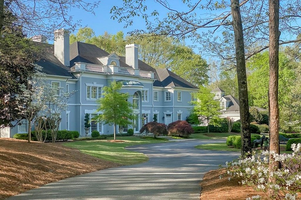 Beautiful setting for this three level manor home 