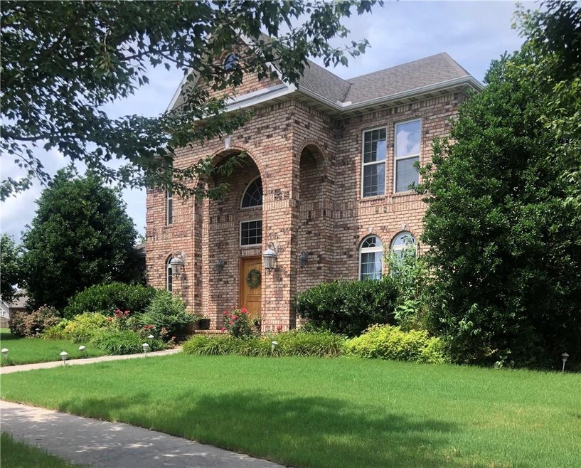Gorgeous two story Har-Ber Meadows home with grand