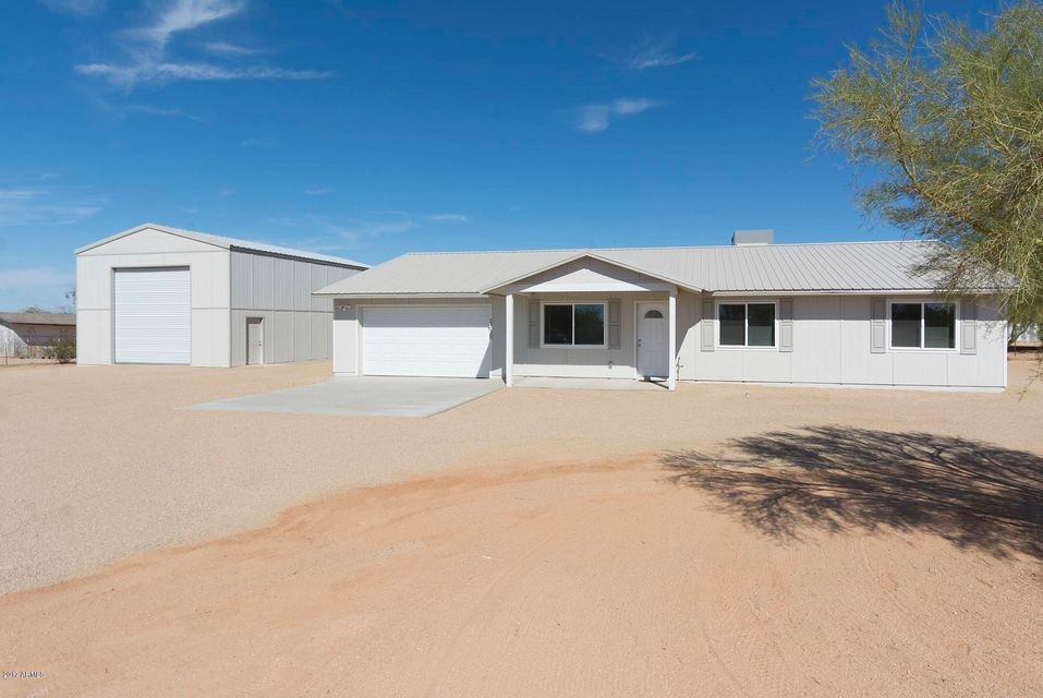 1  24230 E Cholla Rd